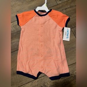 3 month romper with a shark on the booty area. New with tags.
